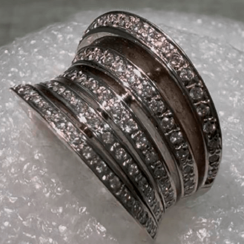 Anel em platina com 05 voltas em diamantes